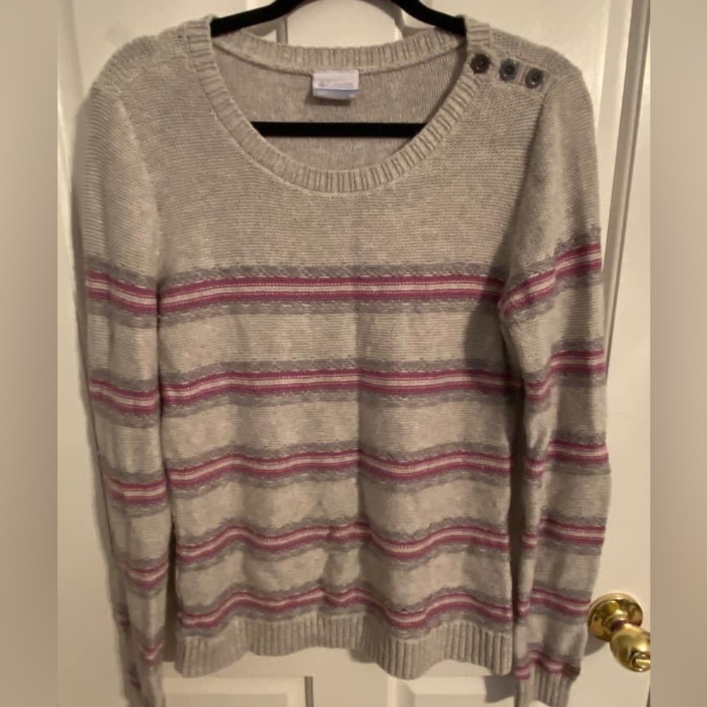 Columbia brand sweater with a button detail